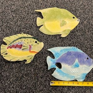 Three. Decorative ceramic fish.